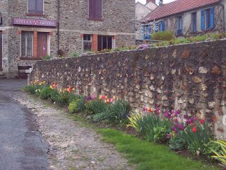 Lucy-le-Bocage Church Wall